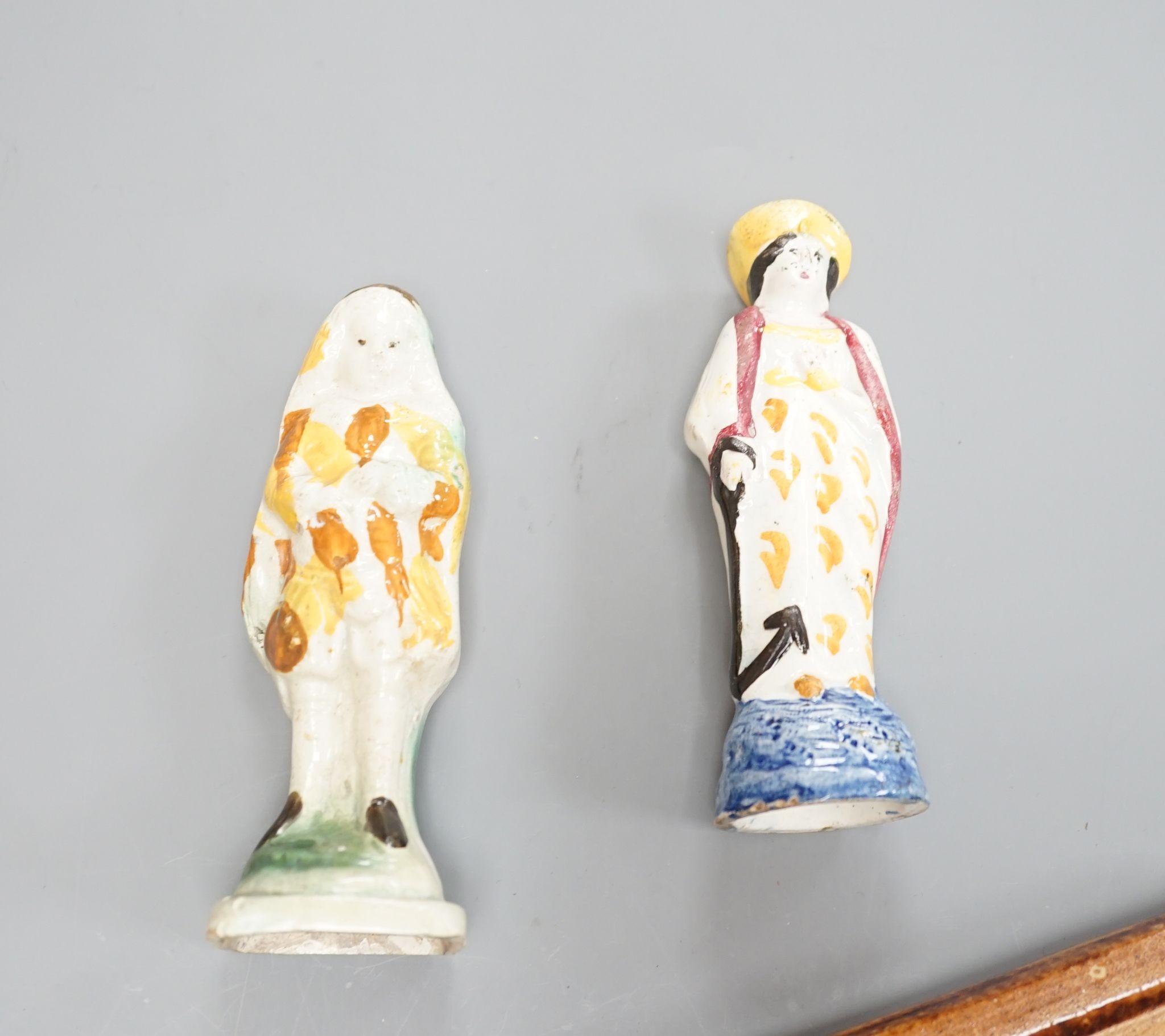 Two prattware figures circa 1800. and a salt-glazed pistol 25cm